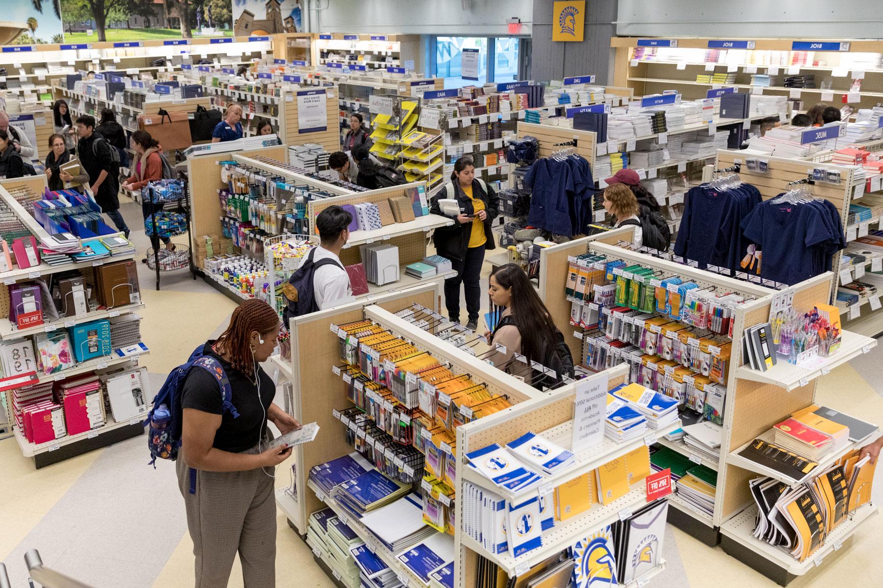 Students roaming around the bookstore.